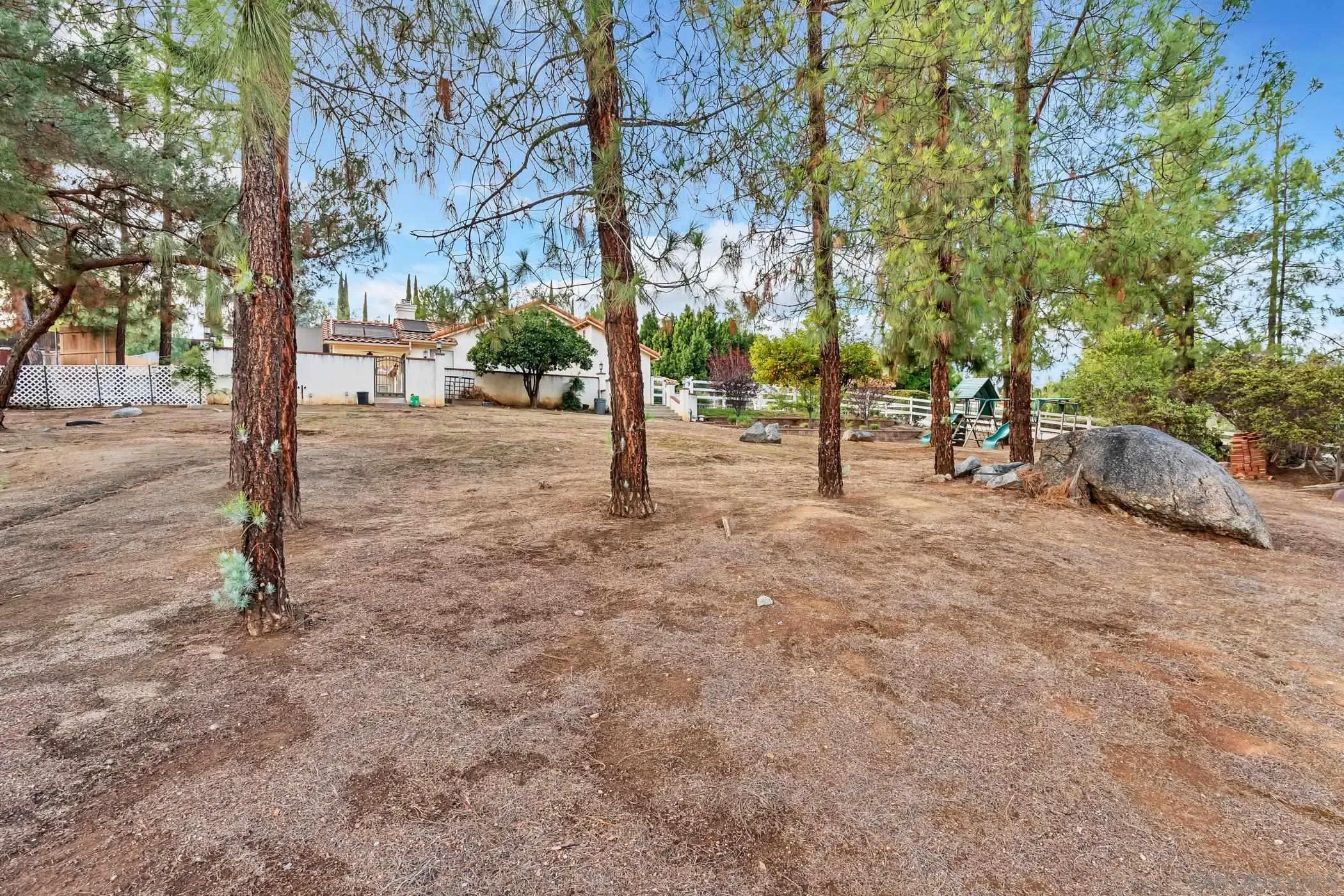 2389 Victoria Circle Alpine, CA 91901 - Photo 58 of 75 a view of a yard with plants and trees