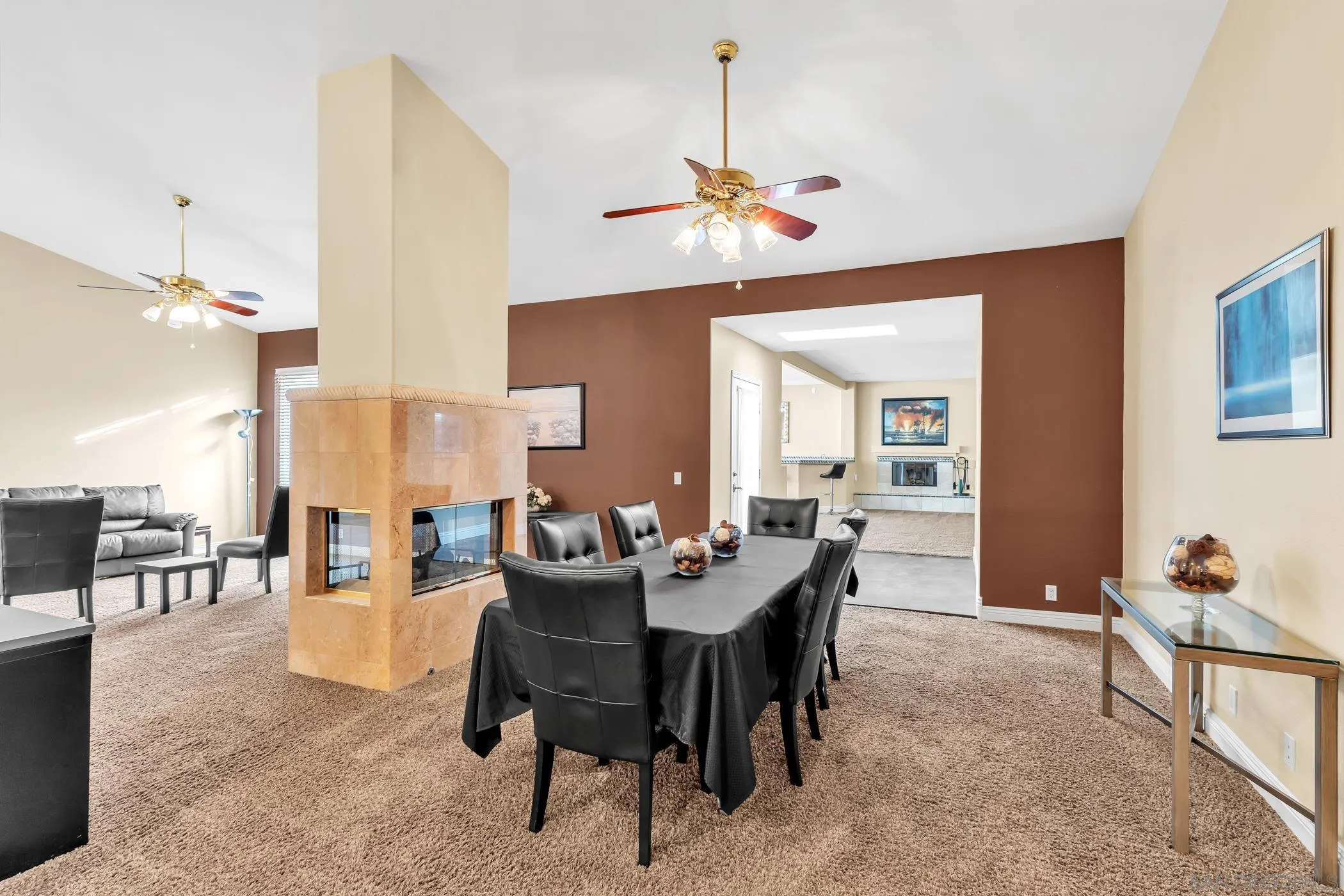 2389 Victoria Circle Alpine, CA 91901 - Photo 6 of 75 a dining room with furniture a chandelier and wooden floor
