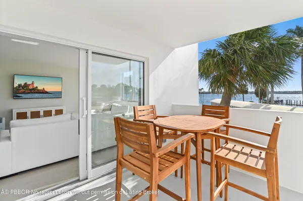 a dinning table and chairs in a room