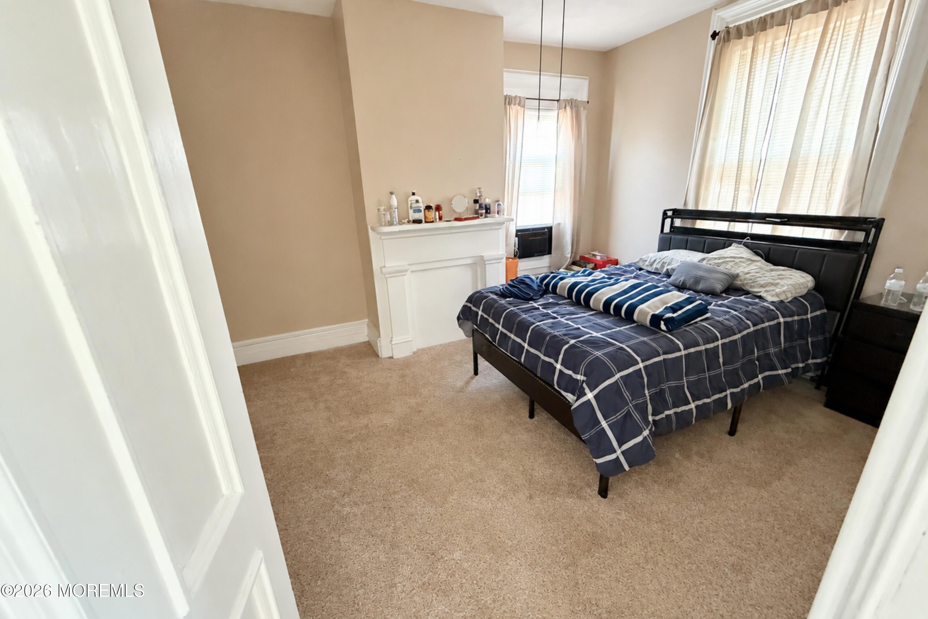 103 Main Street, Unit UPSTAIRS Keyport, NJ 07735 - Photo 19 of 27 Master Bedroom (AI image)