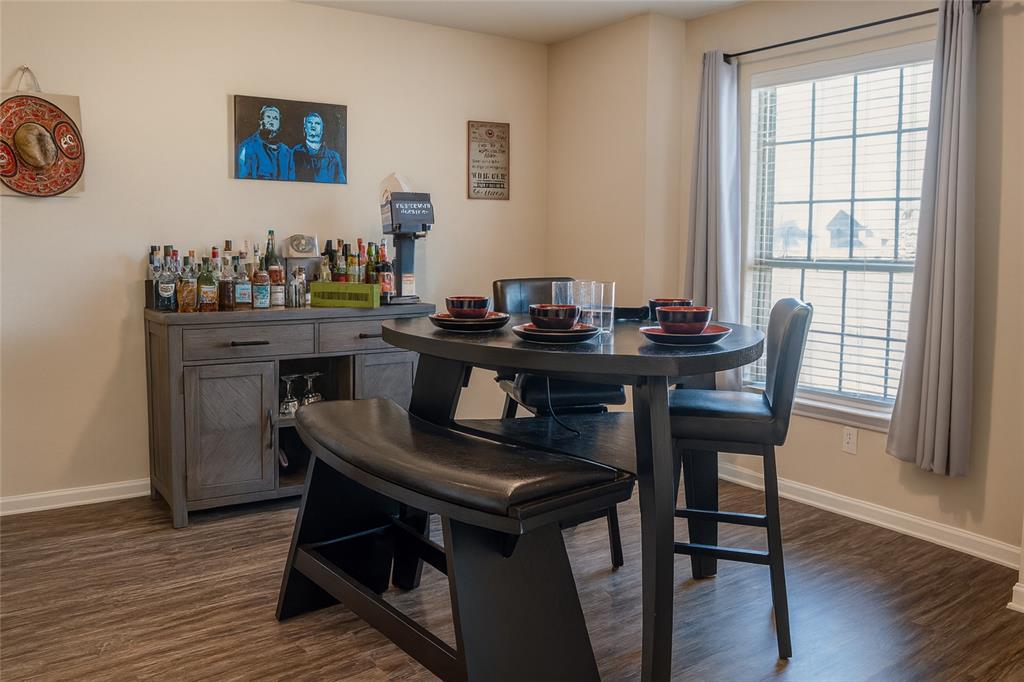 1837 Rialto Lane Crowley, TX 76036 - Photo 9 of 22 a view of a dining room with furniture and wooden floor