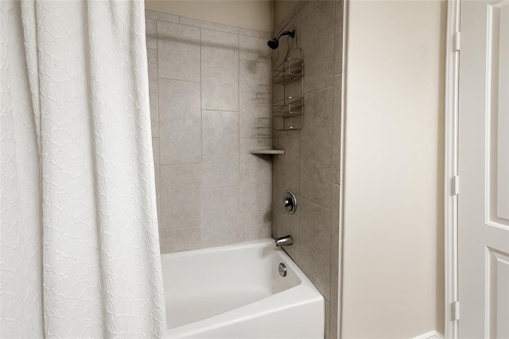 1837 Rialto Lane Crowley, TX 76036 - Photo 10 of 22 a bathroom with a bathtub