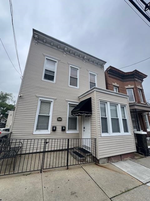 a front view of a house with a window