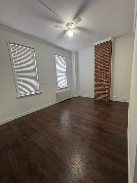 212 68th Street, Unit 1 Guttenberg, NJ 07093 - Photo 4 of 12 a view of an empty room with wooden floor and a window