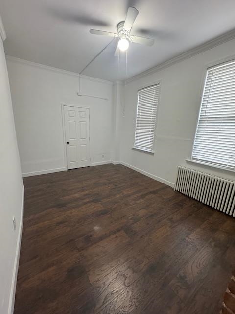 212 68th Street, Unit 1 Guttenberg, NJ 07093 - Photo 5 of 12 en empty room with windows and ceiling fan