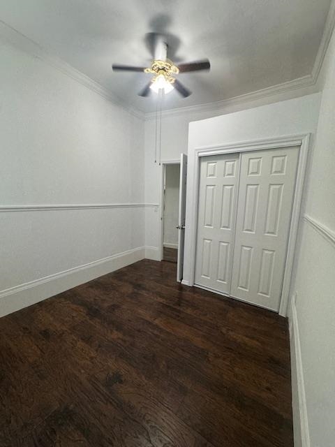 212 68th Street, Unit 1 Guttenberg, NJ 07093 - Photo 6 of 12 a view of a livingroom with a fan a hardwood floor and a ceiling fan