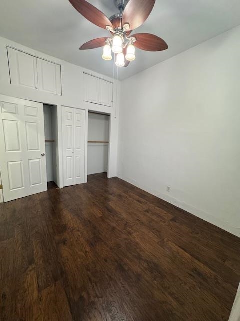 212 68th Street, Unit 1 Guttenberg, NJ 07093 - Photo 10 of 12 an empty room with closet and a ceiling fan
