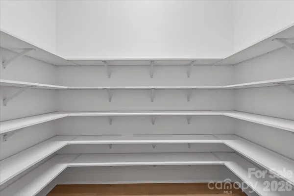 a view of a room with shelves