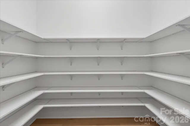 a view of a room with shelves