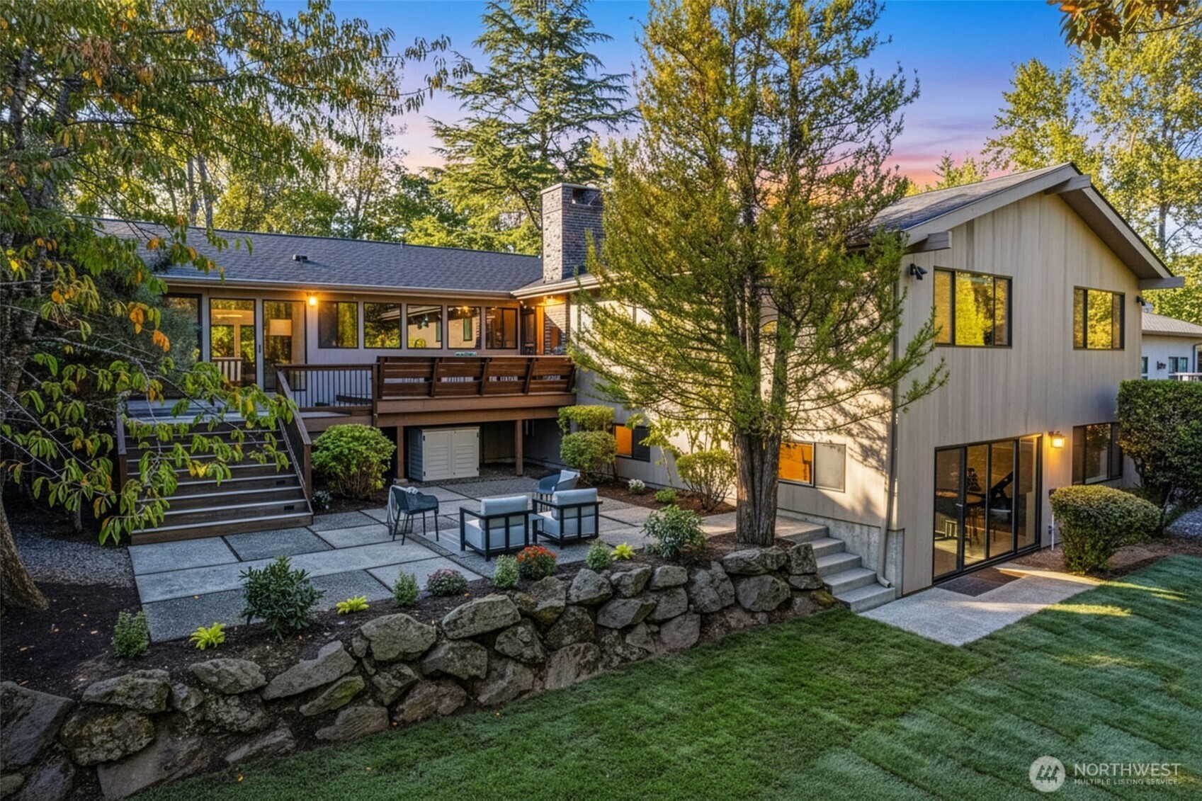 a view of a house with a yard porch and sitting area
