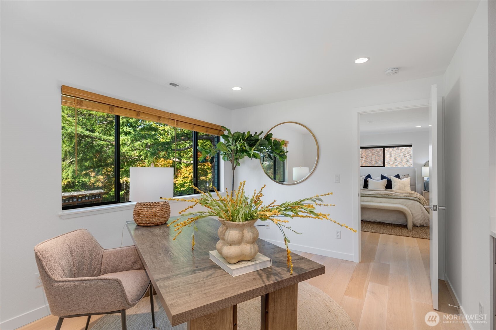 6667 Northeast Windermere Road Seattle, WA 98115 - Photo 18 of 40 a living room with furniture a table and large windows