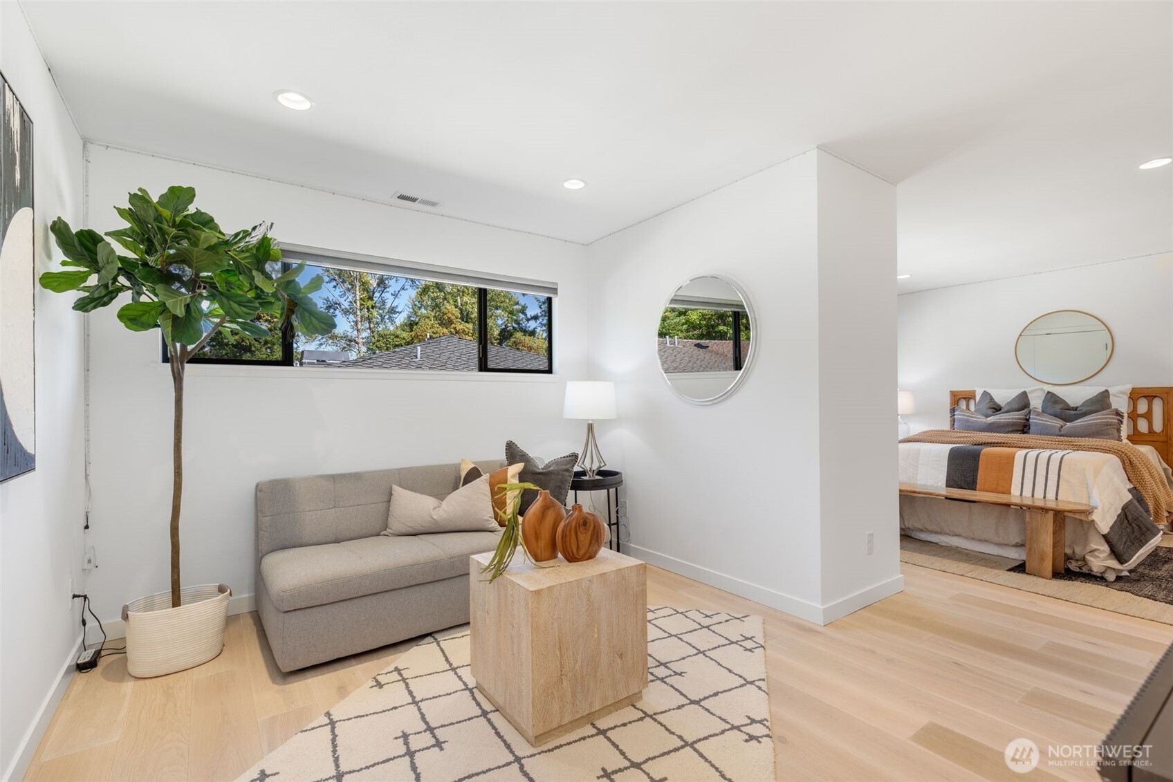 6667 Northeast Windermere Road Seattle, WA 98115 - Photo 20 of 40 a living room with furniture and flowers