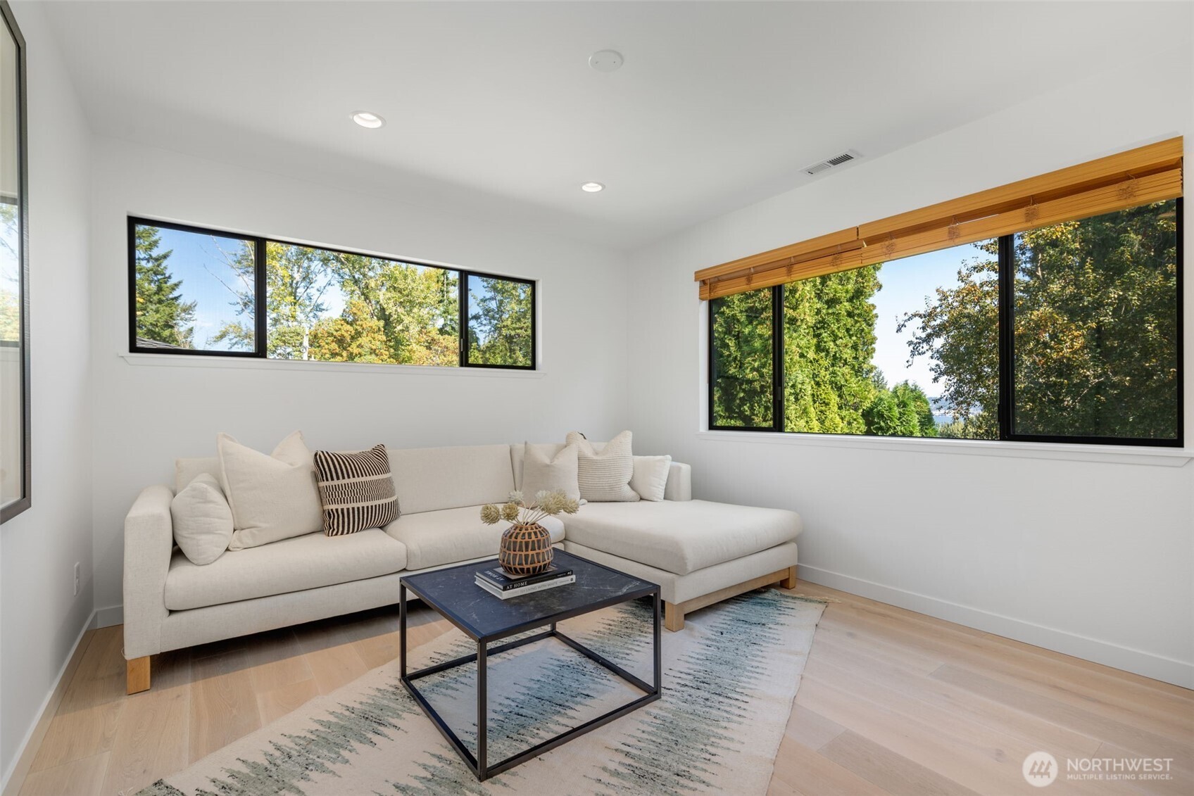 6667 Northeast Windermere Road Seattle, WA 98115 - Photo 24 of 40 a living room with furniture and a large window