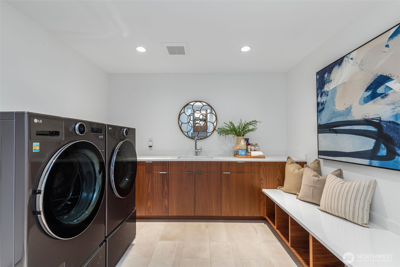 6667 Northeast Windermere Road Seattle, WA 98115 - Photo 29 of 40 a view of a storage and utility room with washer and dryer