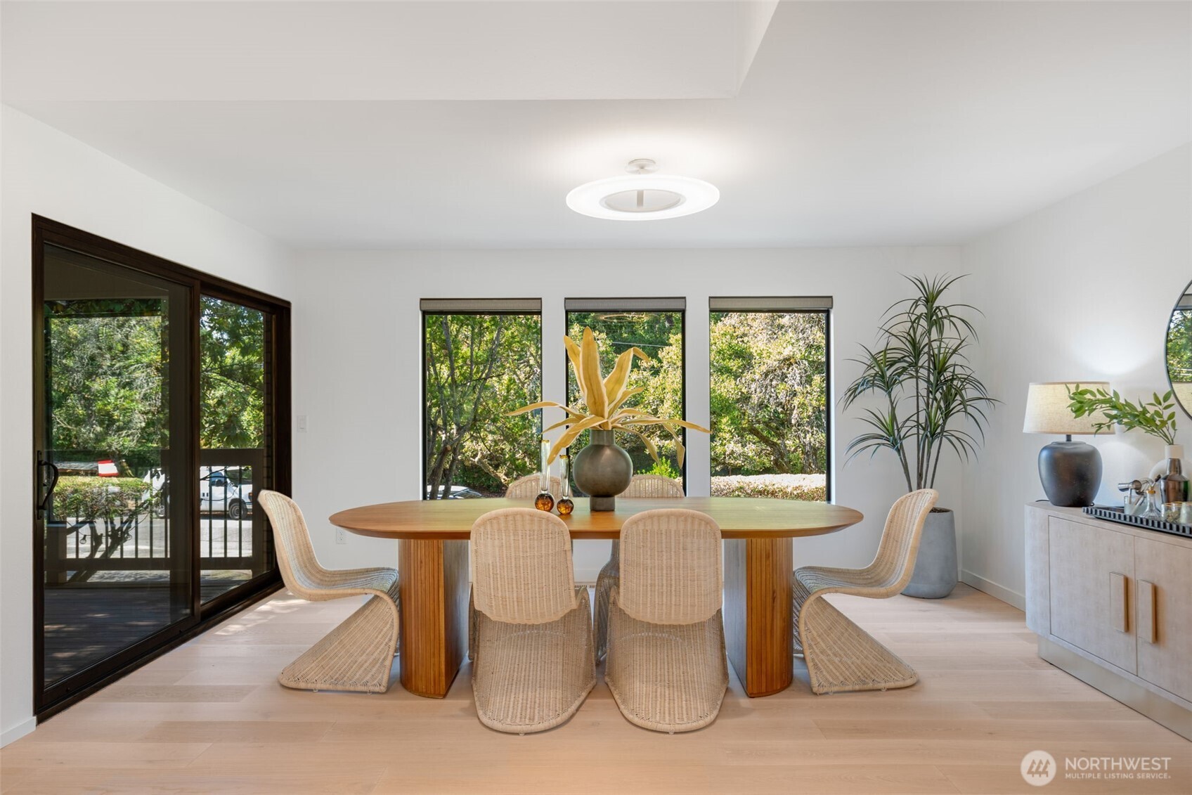 6667 Northeast Windermere Road Seattle, WA 98115 - Photo 8 of 40 a view of a dining room with furniture window and outside view