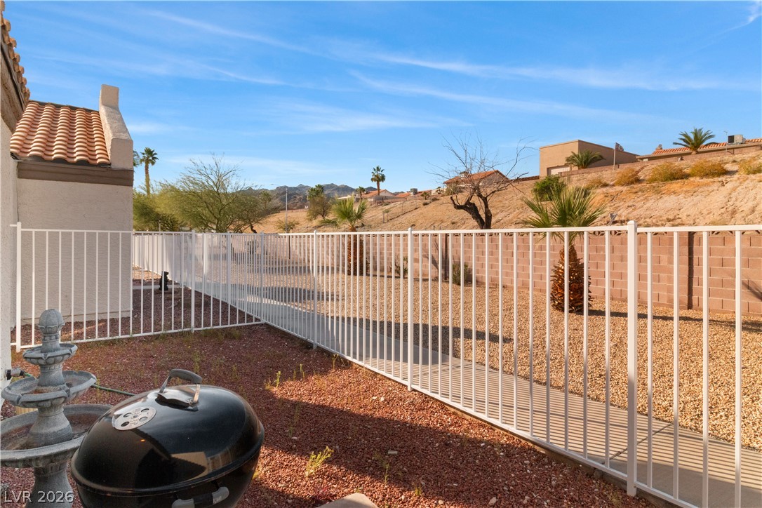 2124 Pebble Creek Lane Laughlin, NV 89029 - Photo 37 of 54 View of fenced backyard