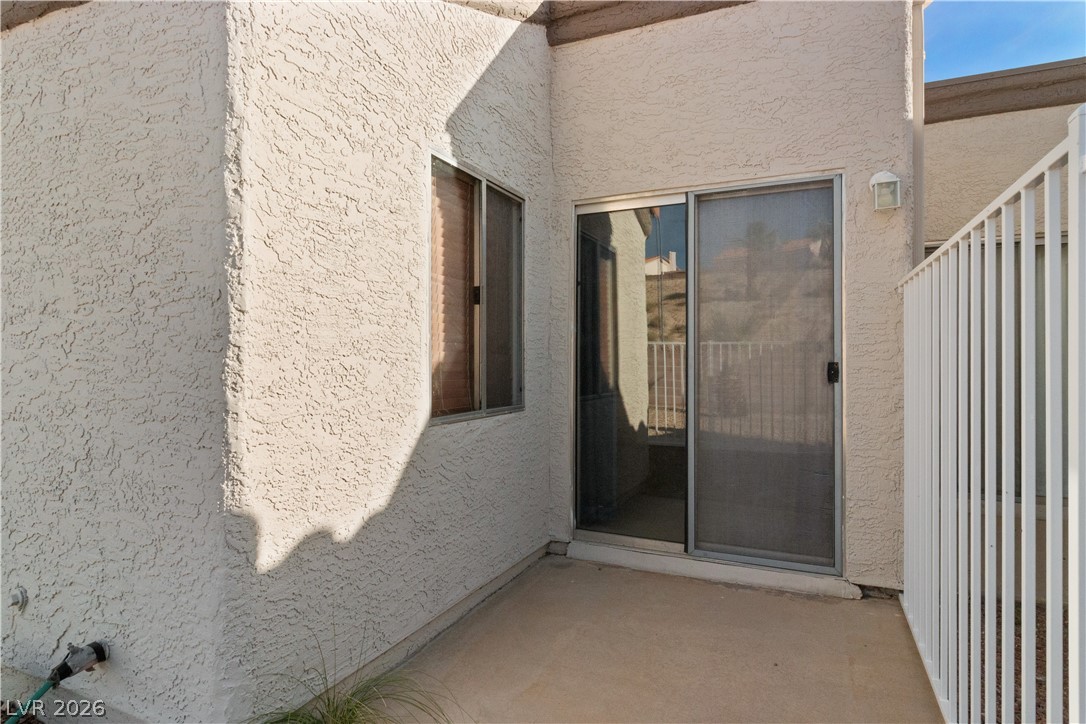 2124 Pebble Creek Lane Laughlin, NV 89029 - Photo 41 of 54 Exterior patio featuring sliding glass door access to Primary Bedroom