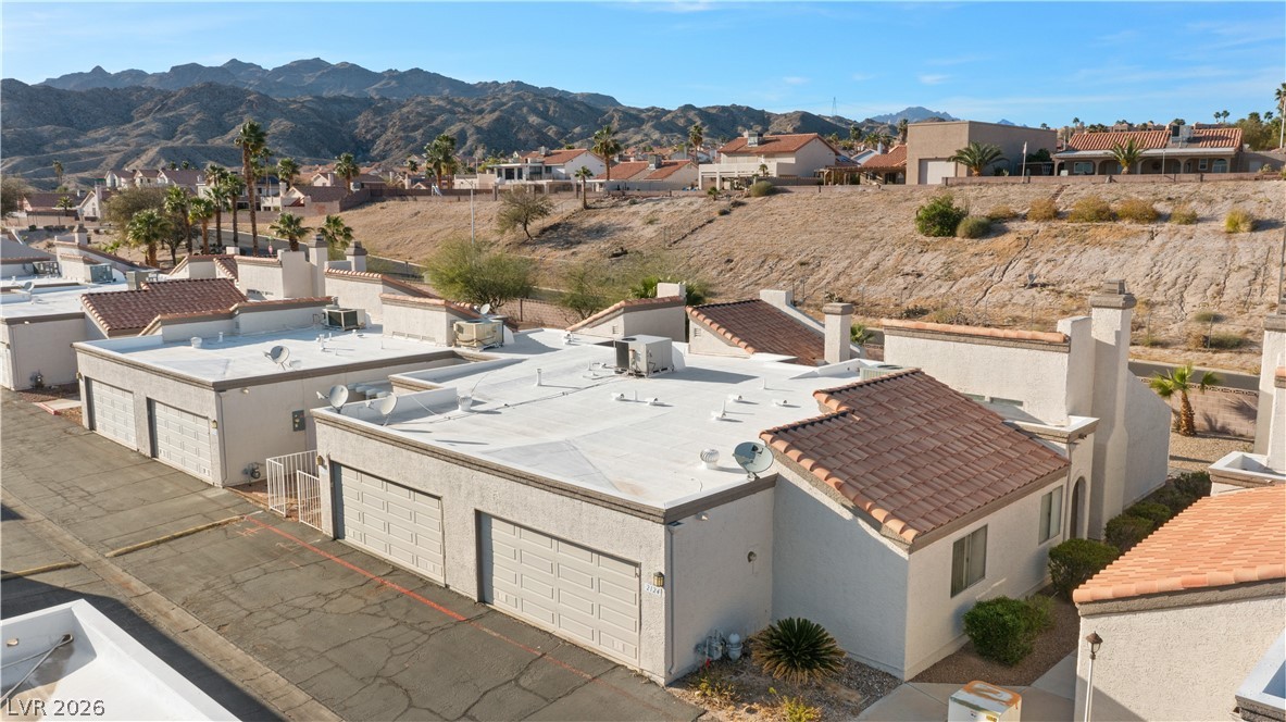 2124 Pebble Creek Lane Laughlin, NV 89029 - Photo 53 of 54 Aerial view of residential area with a mountainous background