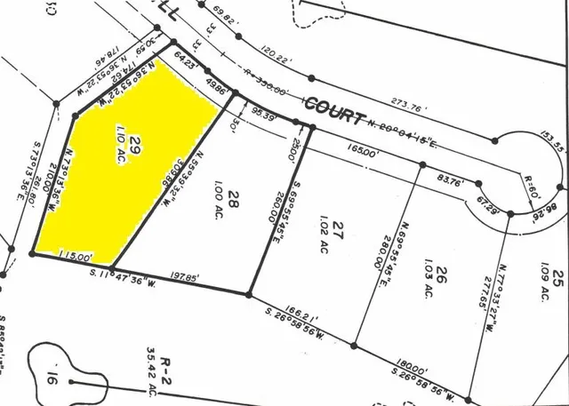 a view of a swimming pool with a patio and swimming pool