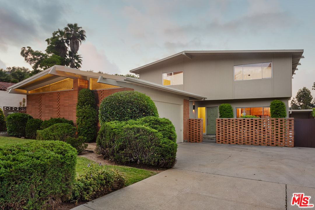 2116 Moreno Drive Los Angeles, CA 90039 - Photo 1 of 22 a front view of a house with a yard