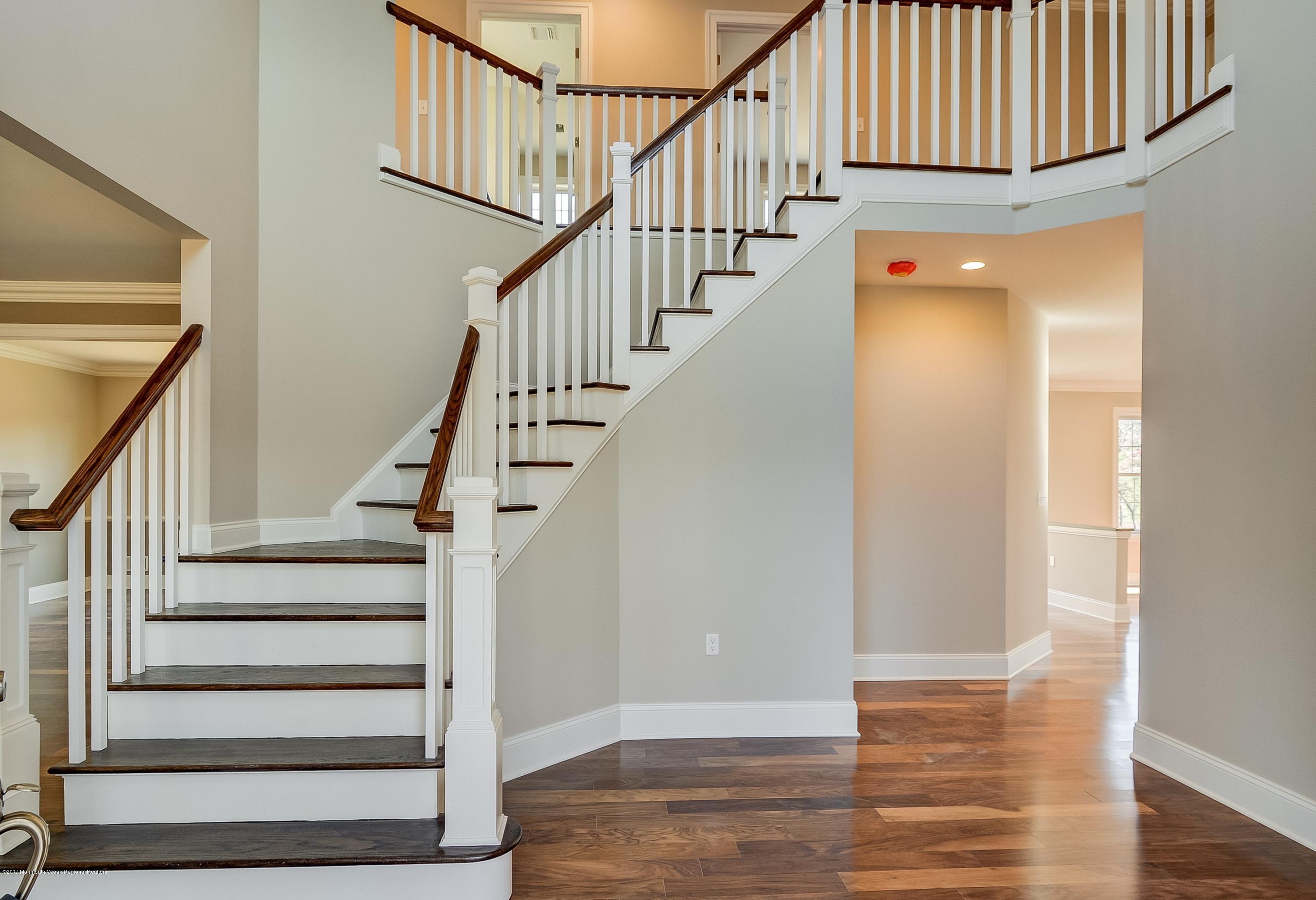 91 Obre Road Colts Neck, NJ 07722 - Photo 4 of 33 a view of entryway with wooden floor