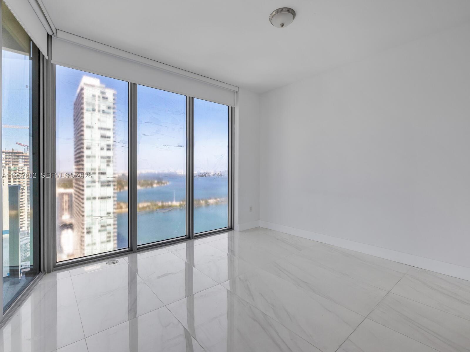 2900 Northeast 7th Avenue, Unit 3301 Miami, FL 33137 - Photo 12 of 55 a view of an empty room and window