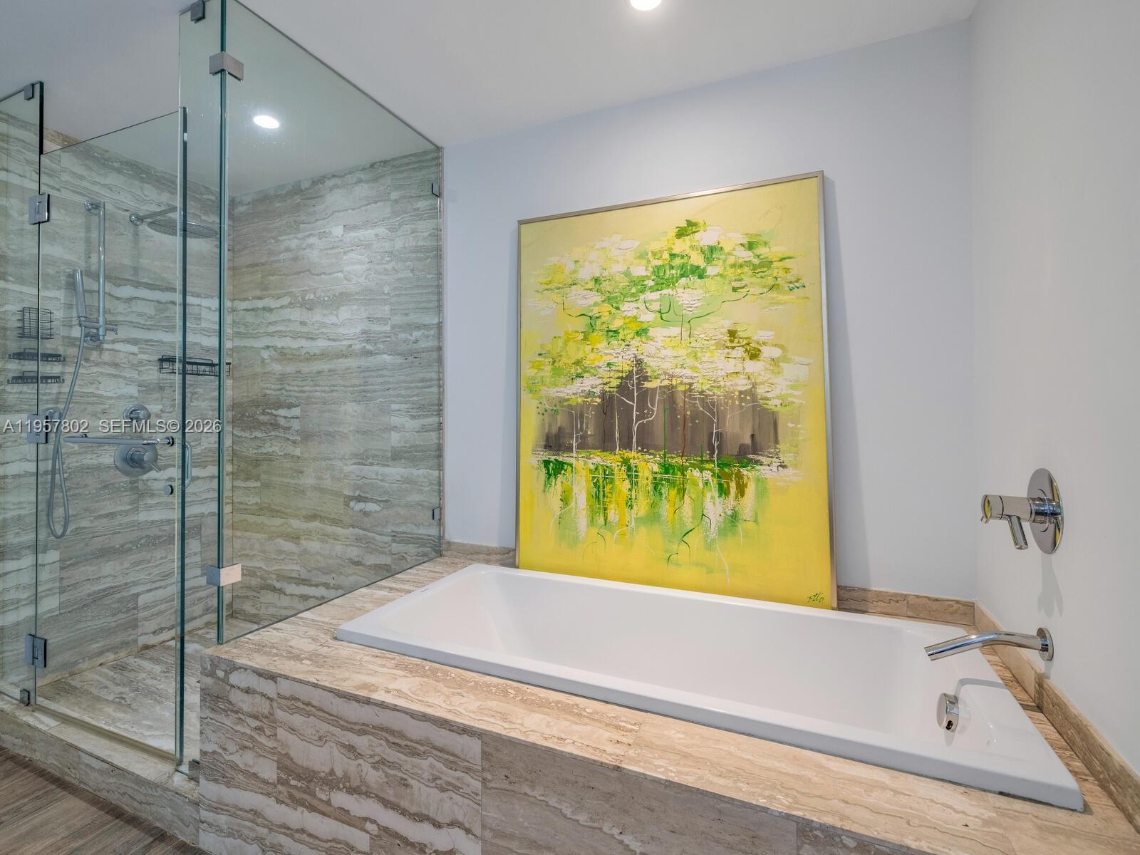 2900 Northeast 7th Avenue, Unit 3301 Miami, FL 33137 - Photo 15 of 55 a bathroom with a bathtub and a shower