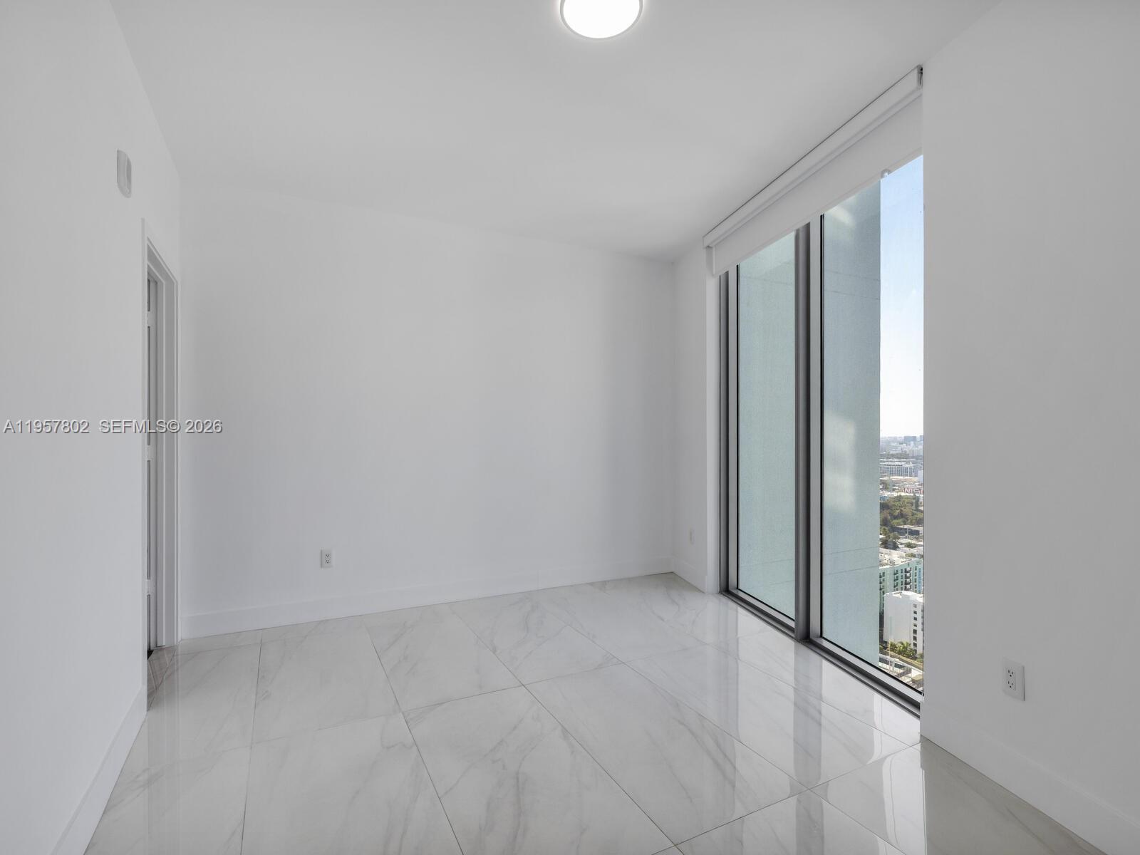 2900 Northeast 7th Avenue, Unit 3301 Miami, FL 33137 - Photo 21 of 55 an empty room with windows