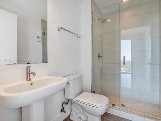 a view of a city with tall buildings