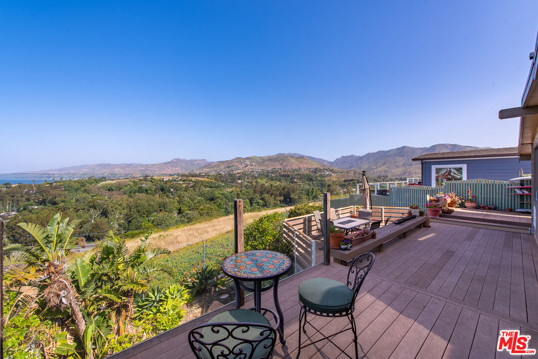 29500 Heathercliff Road, Unit 202 Malibu, CA 90265 - Photo 19 of 36 a view of a chairs and table in patio of a house