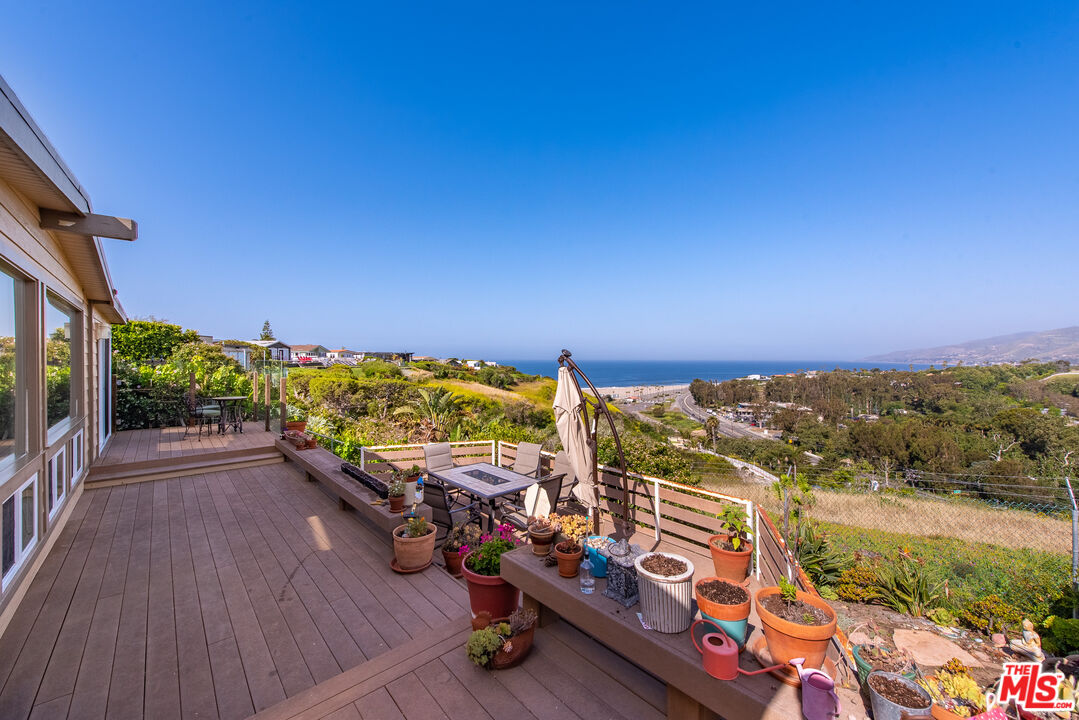 29500 Heathercliff Road, Unit 202 Malibu, CA 90265 - Photo 29 of 36 an outdoor space with furniture