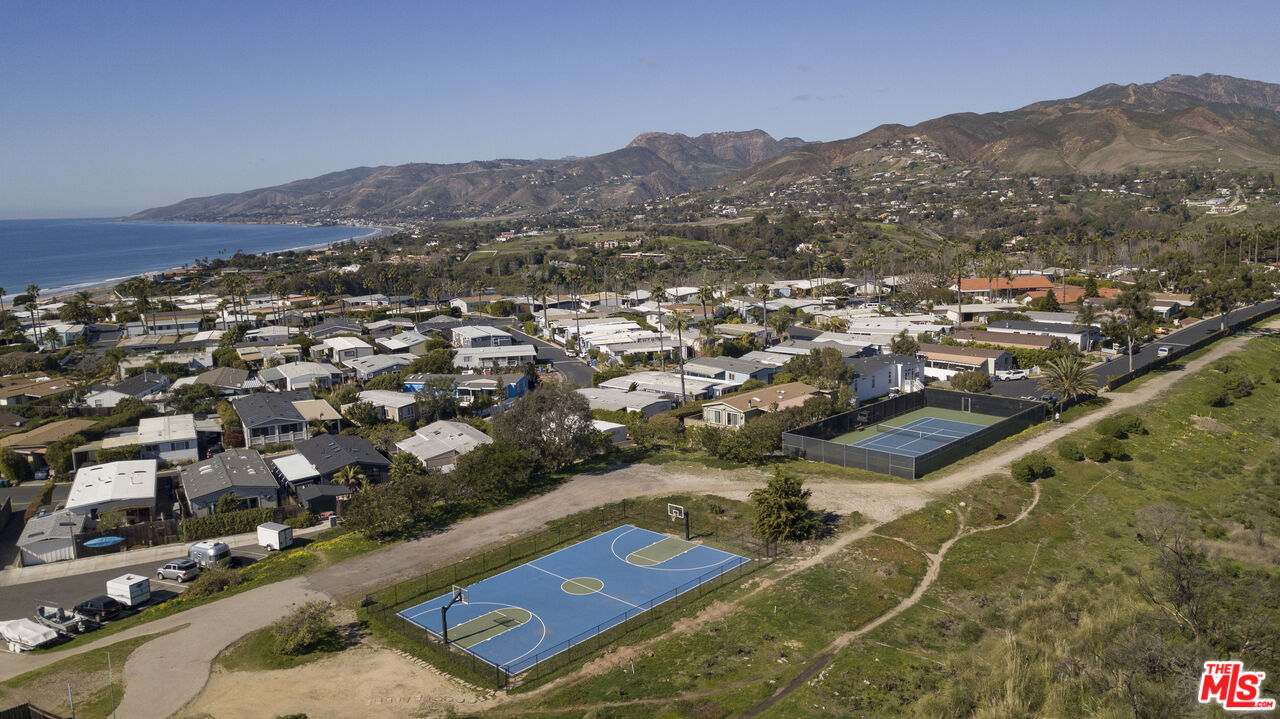 29500 Heathercliff Road, Unit 202 Malibu, CA 90265 - Photo 35 of 36 an aerial view of residential houses with outdoor space and mountain view