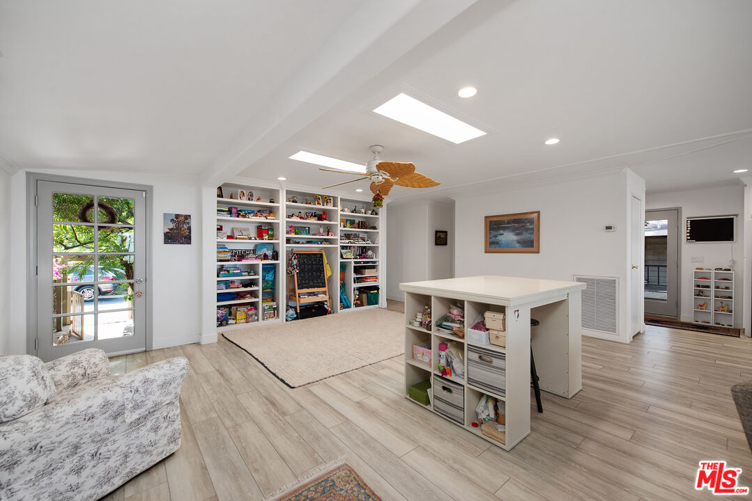 29500 Heathercliff Road, Unit 202 Malibu, CA 90265 - Photo 10 of 36 a living room with furniture and a wooden floor