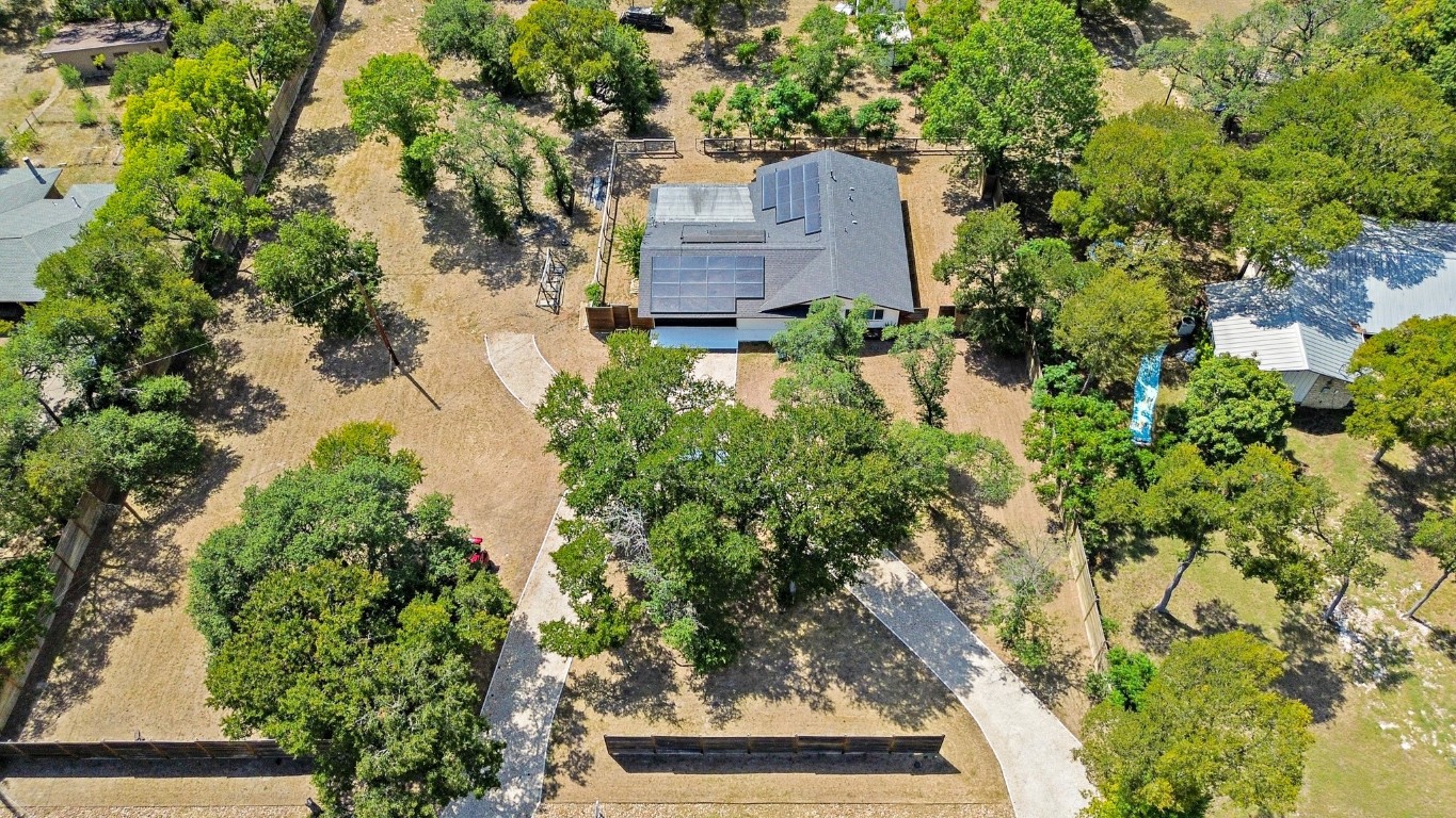 9110 Chisholm Lane Austin, TX 78748 - Photo 2 of 27 an aerial view of a house with a yard and garden
