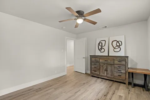 a view of a livingroom with wooden floor