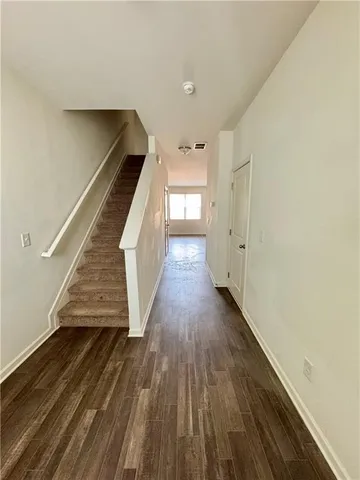 a view of entryway with wooden floor