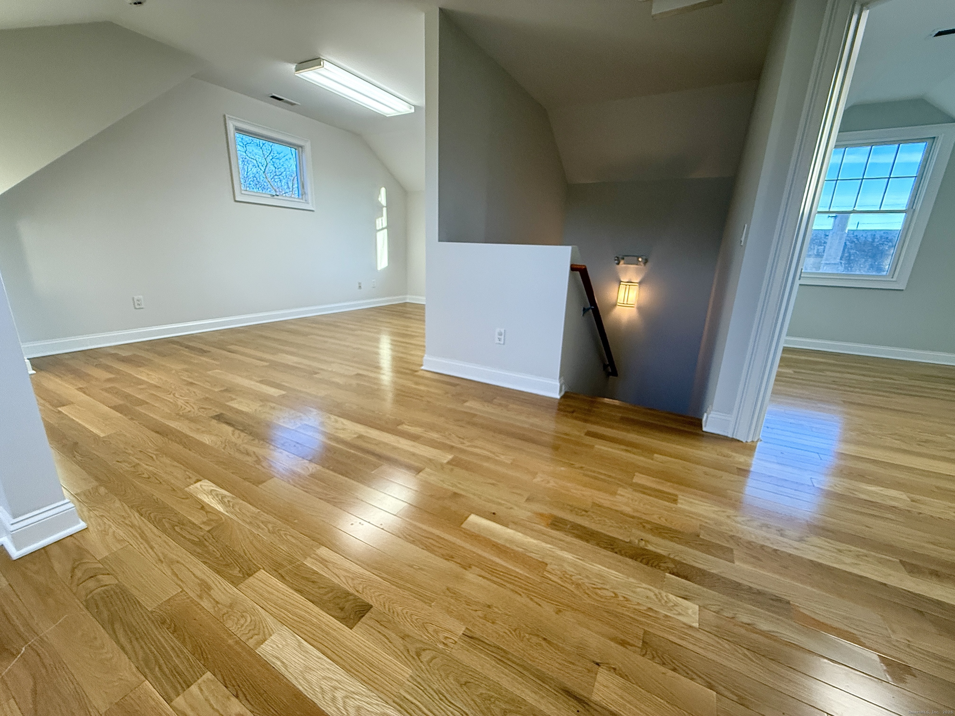 5 Myrtle Street Norwalk, CT 06855 - Photo 11 of 15 a view of empty room with wooden floor