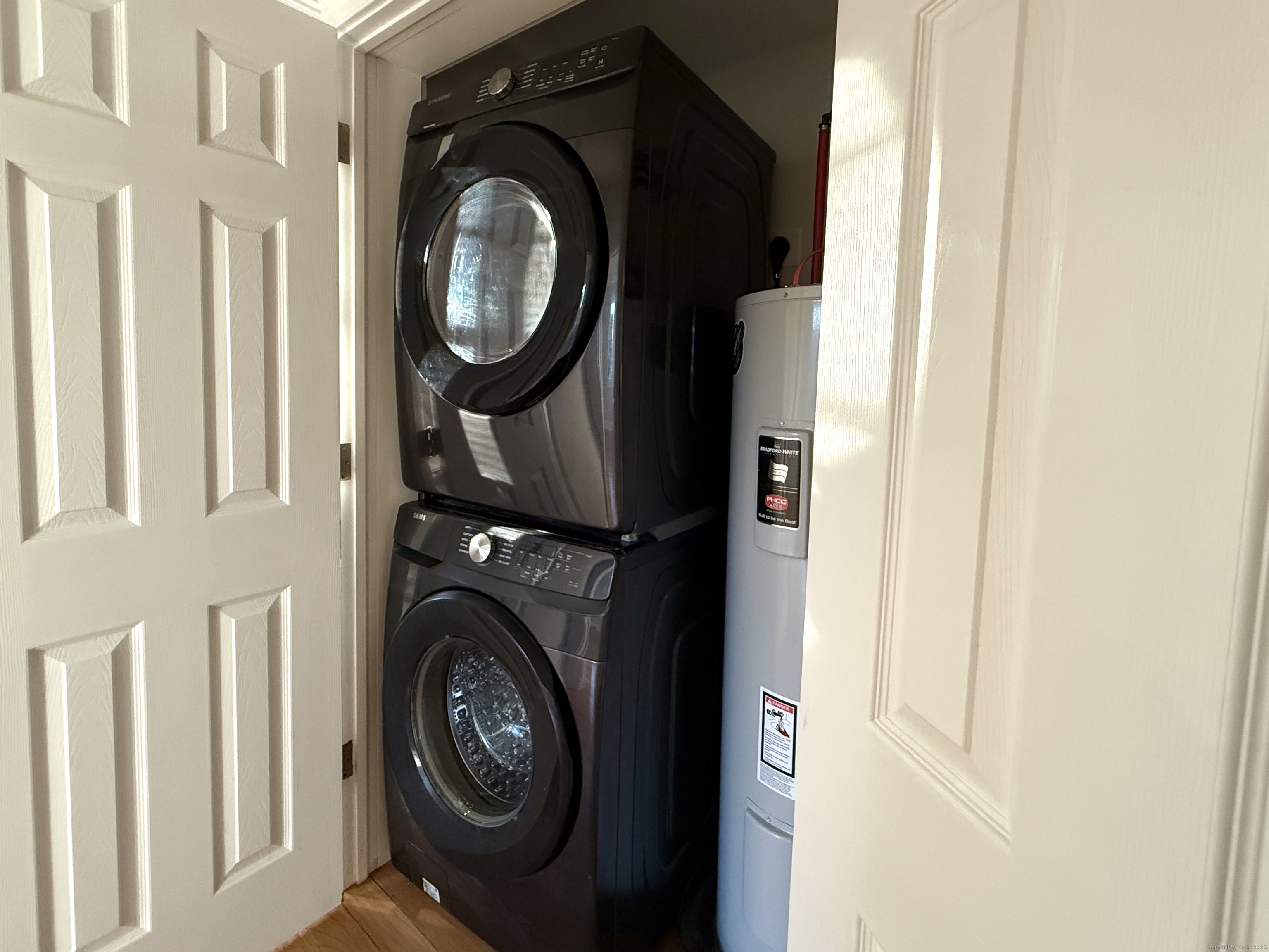 5 Myrtle Street Norwalk, CT 06855 - Photo 8 of 15 a utility room with dryer and washer