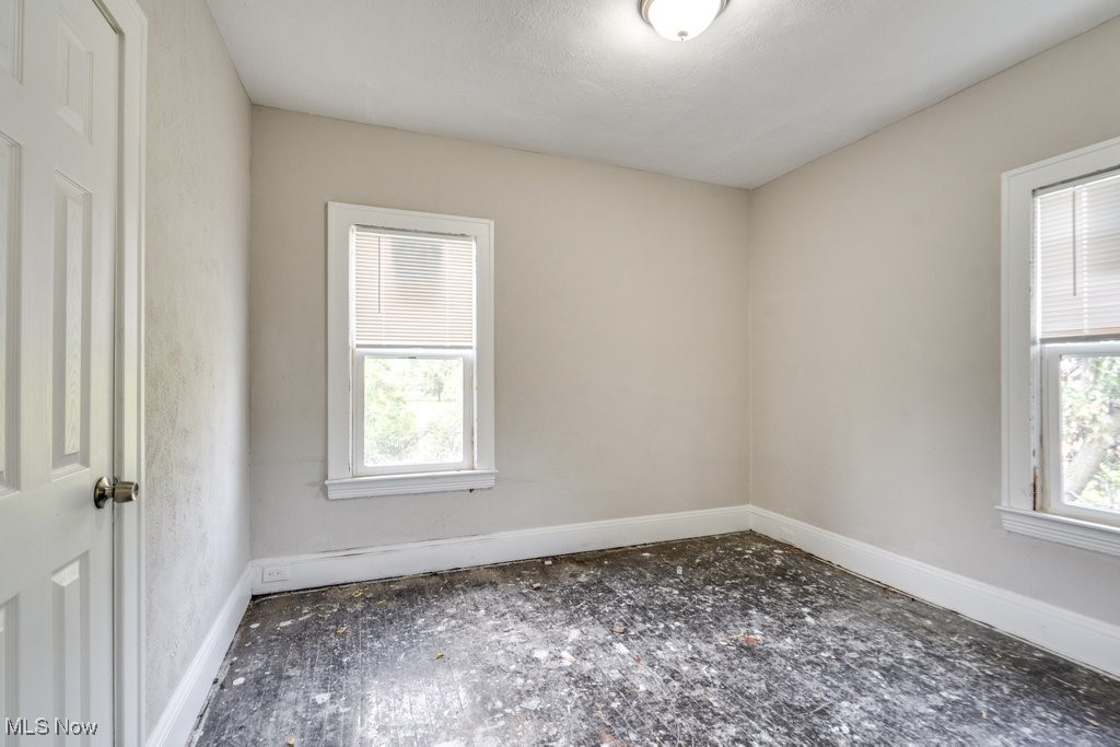 1618 Catalpa Road Cleveland, OH 44112 - Photo 22 of 33 Empty room with healthy amount of natural light