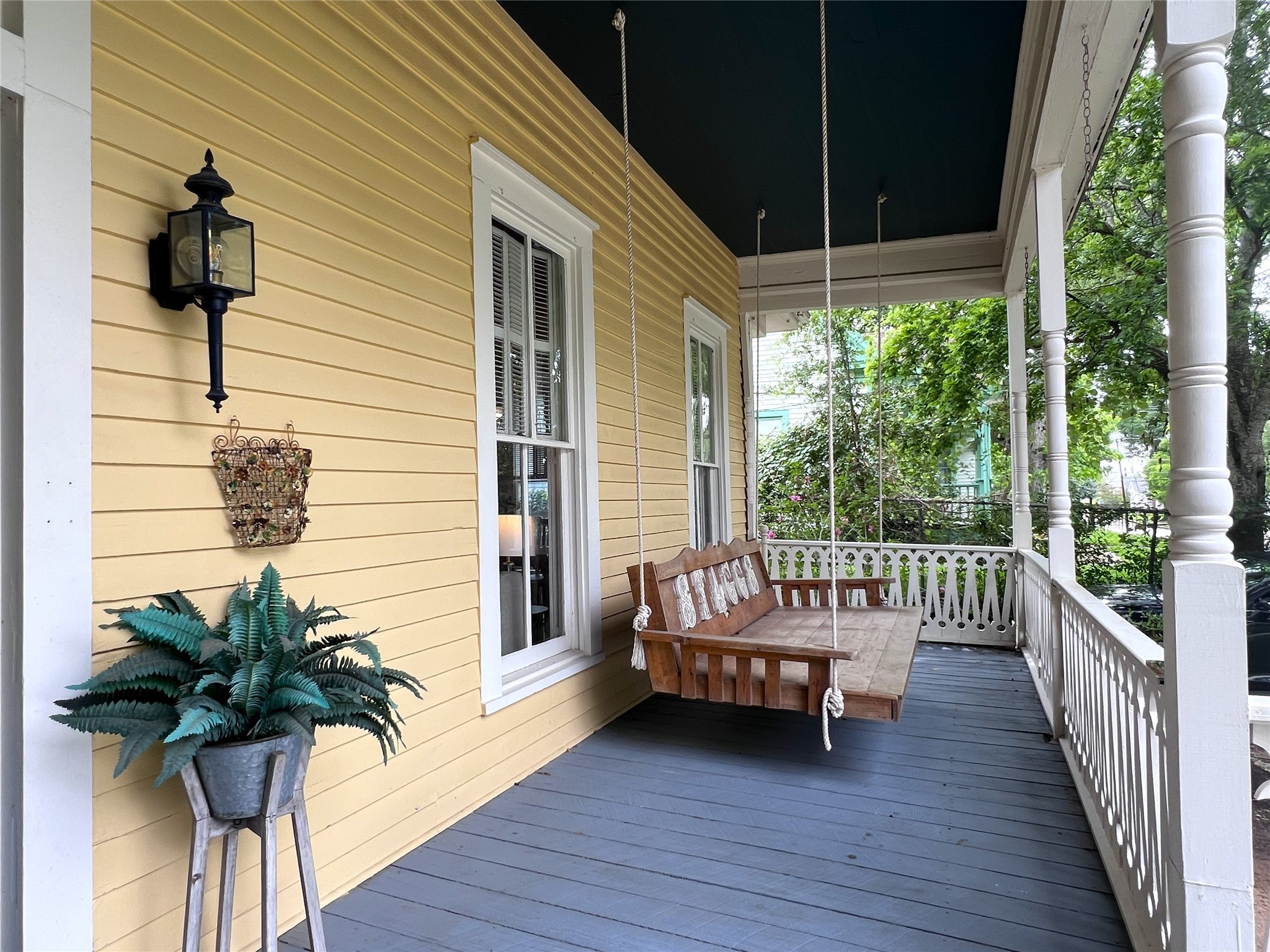 606 Sycamore Street Brenham, TX 77833 - Photo 4 of 27 a view of a chair and tables in the balcony