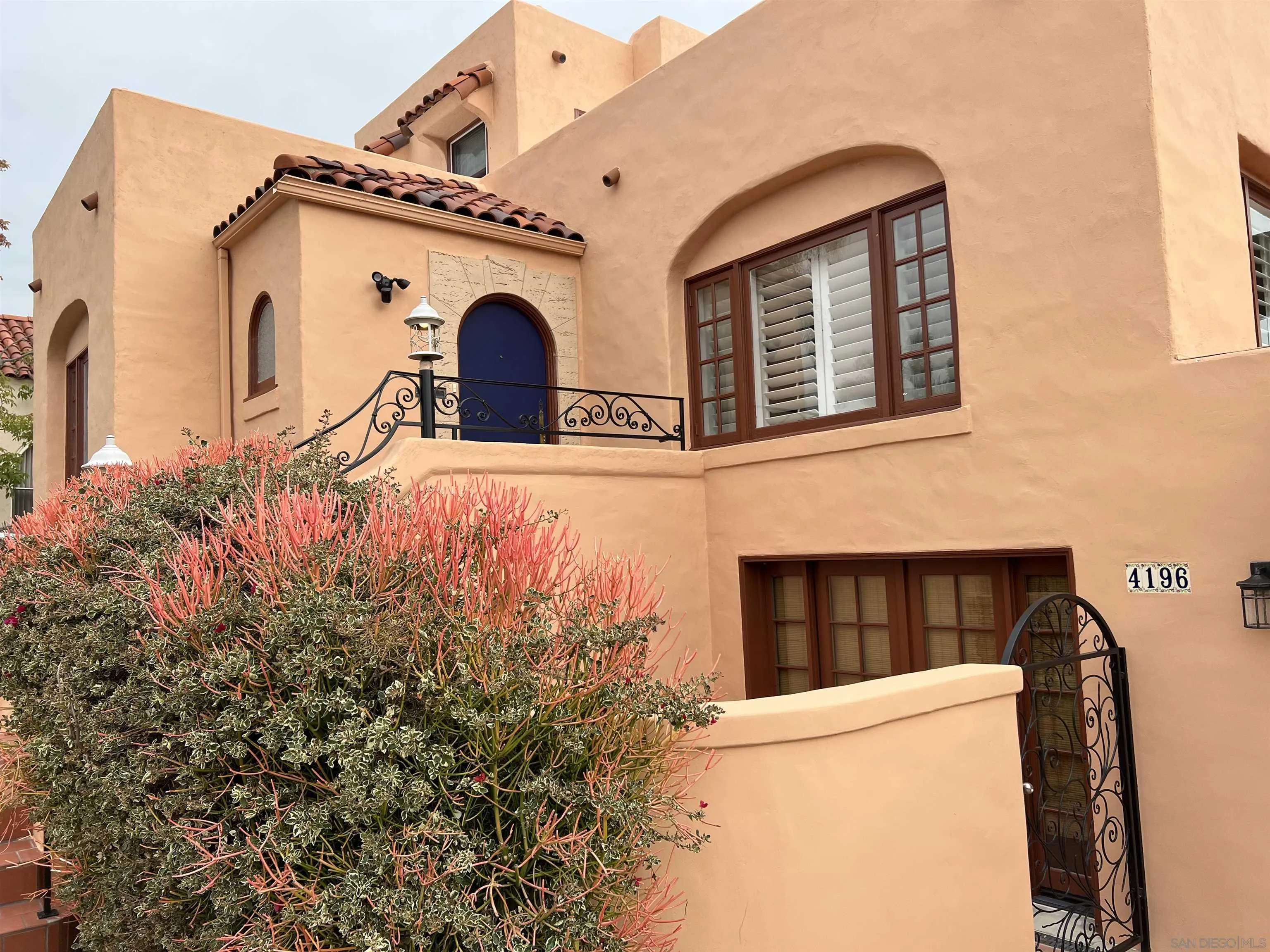 4196 Rochester Road San Diego, CA 92116 - Photo 3 of 72 a front view of a house with parking