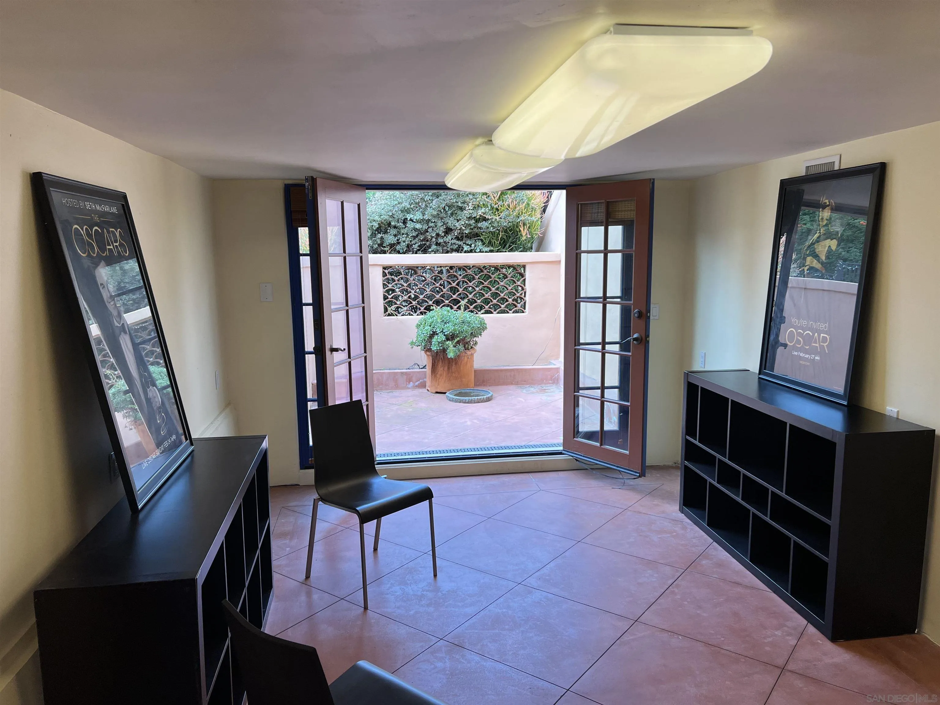 4196 Rochester Road San Diego, CA 92116 - Photo 32 of 72 a living room with furniture and a window