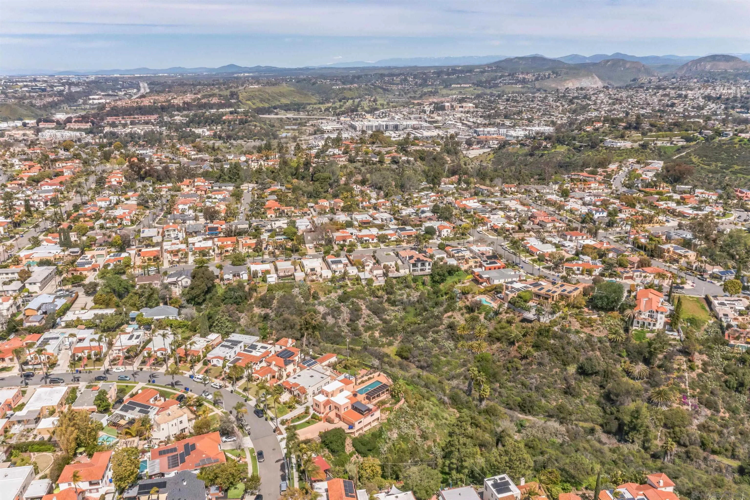 4196 Rochester Road San Diego, CA 92116 - Photo 41 of 72 an aerial view of residential houses with outdoor space