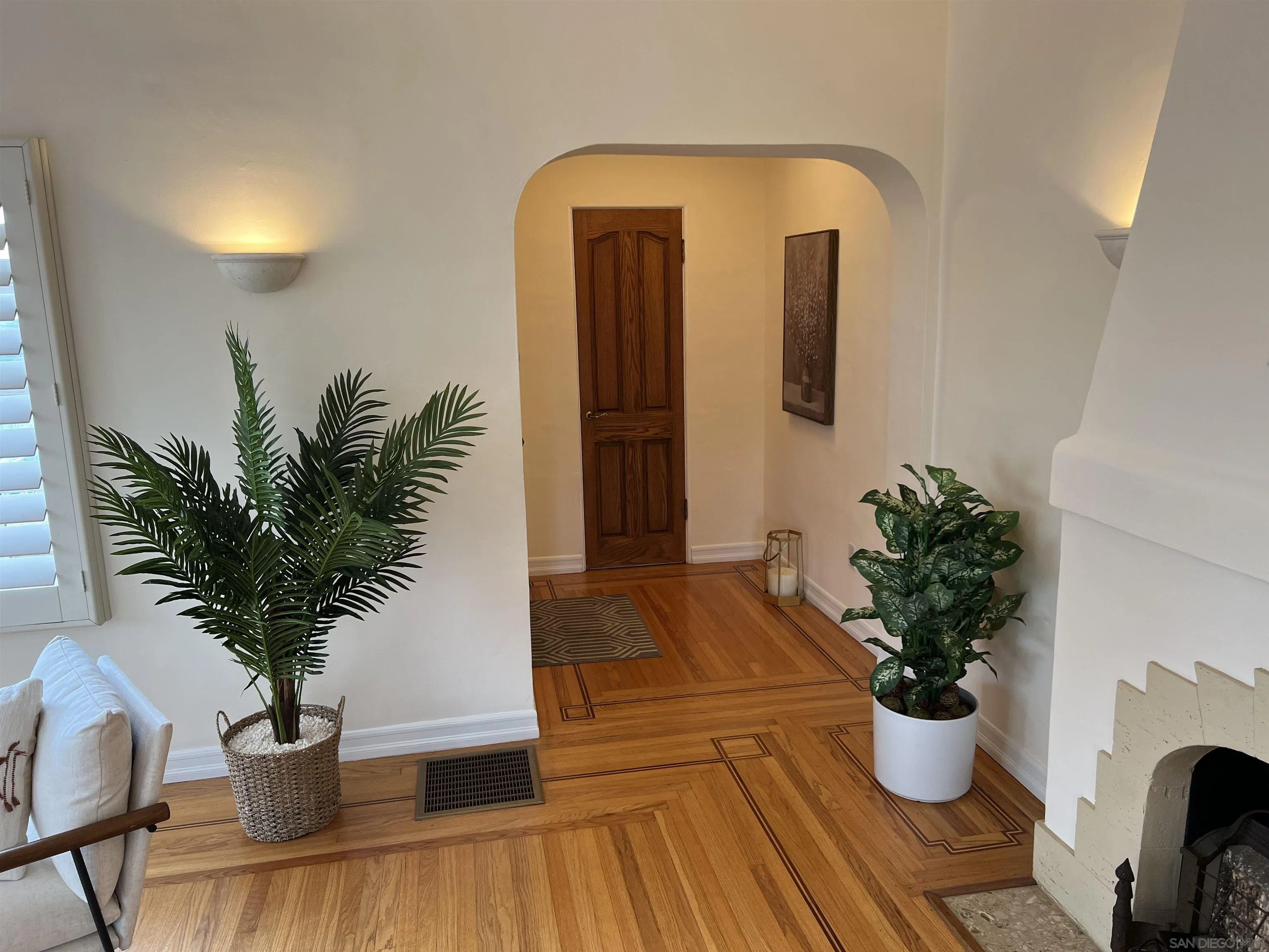 4196 Rochester Road San Diego, CA 92116 - Photo 6 of 72 a view of a living room and a potted plant