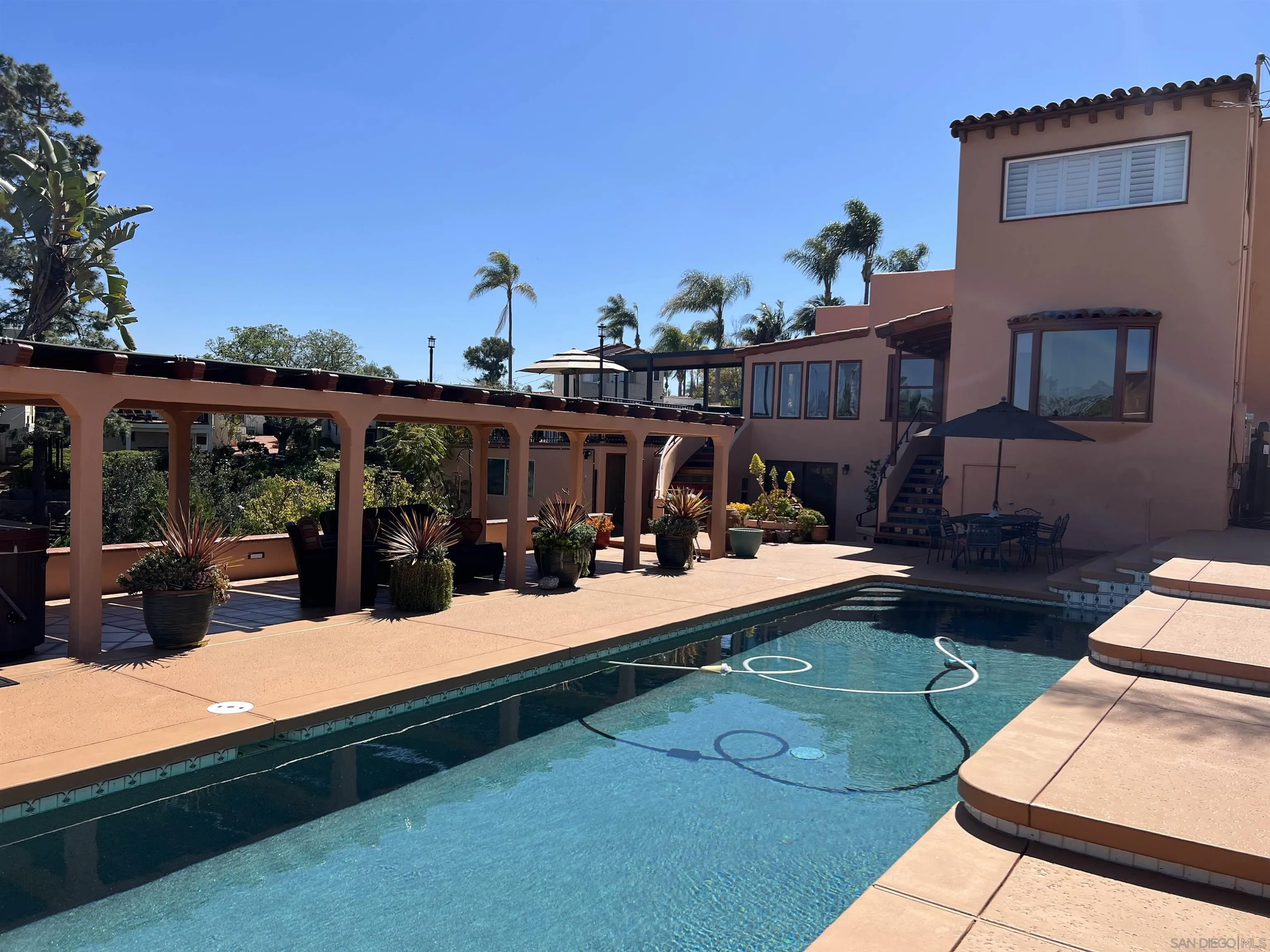 4196 Rochester Road San Diego, CA 92116 - Photo 62 of 72 a view of a chairs and tables in the patio