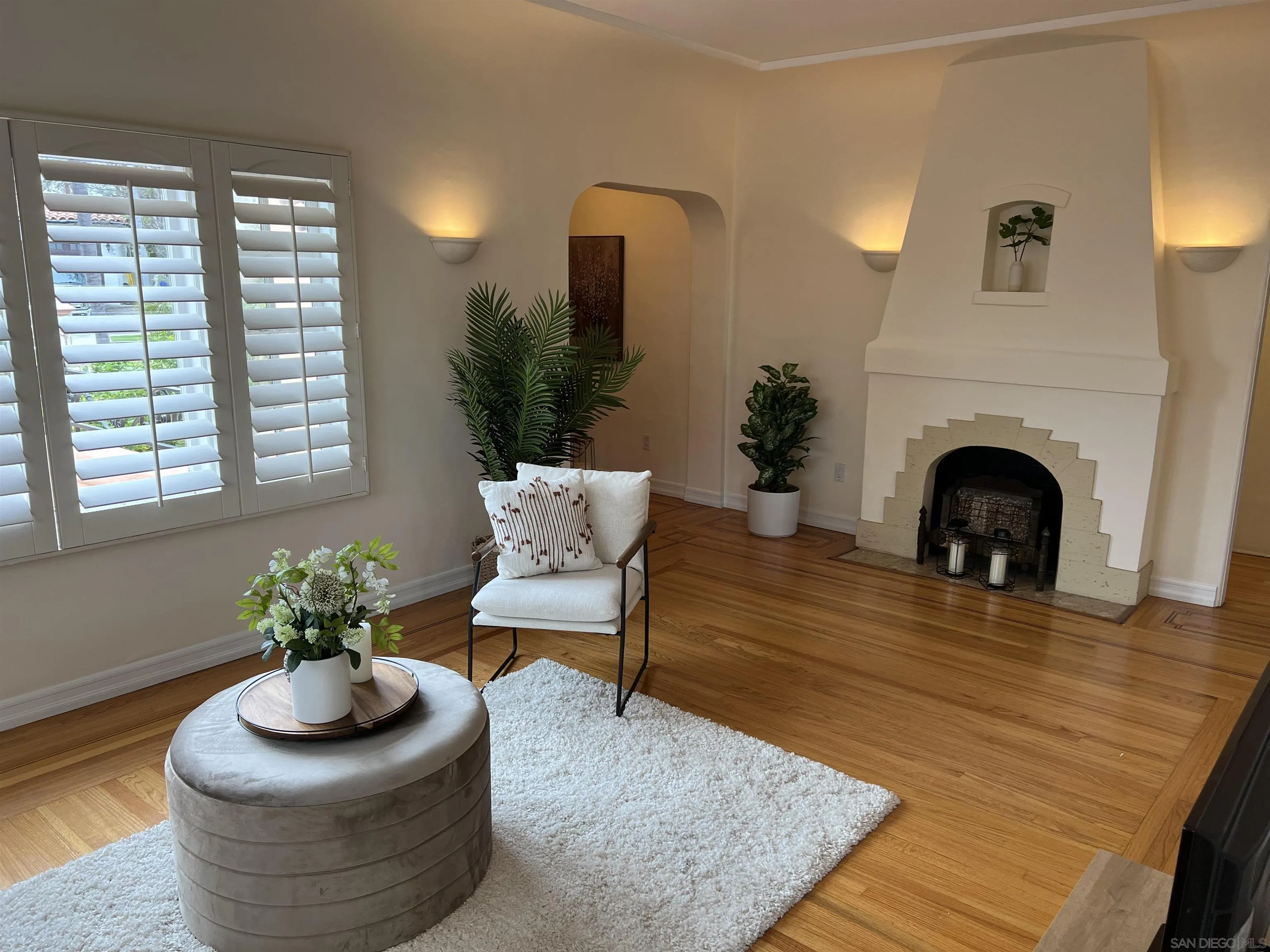 4196 Rochester Road San Diego, CA 92116 - Photo 9 of 72 a living room with furniture and a fireplace