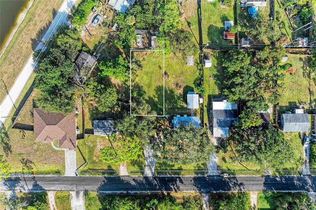 0 Park Road Venice, FL 34293 - Photo 3 of 24 an aerial view of a residential houses with yard and green space