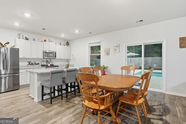 a view of kitchen with breakfast area