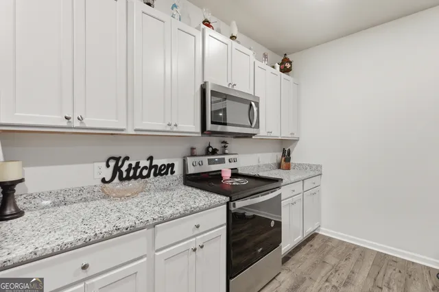 a bedroom with a bed and dresser