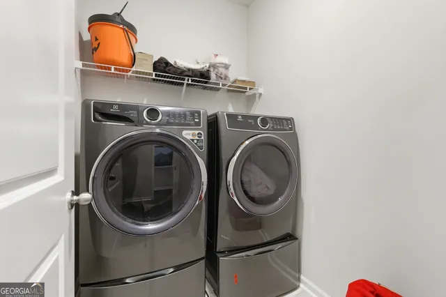 a bedroom with a bed and furniture